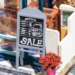 Rolife Nancy’s Bake Shop DG143 - DIY Miniature Dollhouse -Celebrations and Toys rolife rolife nancys bake shop dg143 diy miniature 1